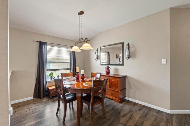 1111 Whitley Dr, Leander, TX 78641 - dining room featuring dark wood-type flooring and lofted ceiling