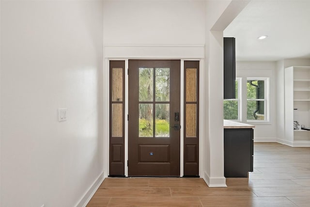 280 Bali Hai Ln, Bastrop, TX 78602 - foyer with light wood-style flooring and recessed lighting