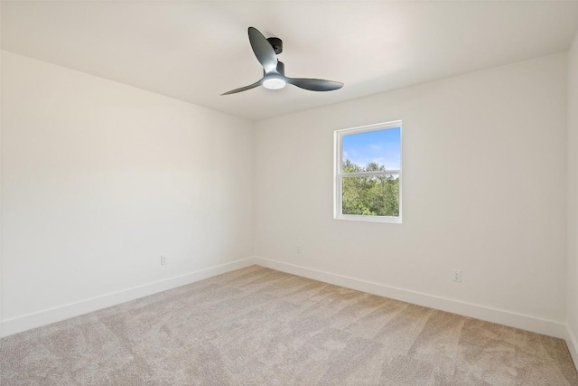 280 Bali Hai Ln, Bastrop, TX 78602 - unfurnished room featuring light carpet and a ceiling fan