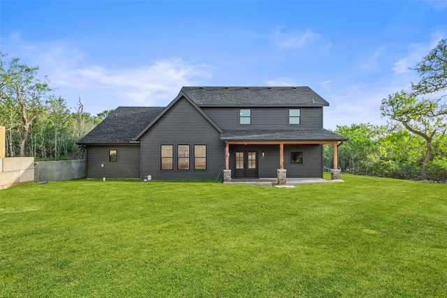 280 Bali Hai Ln, Bastrop, TX 78602 - back of house with french doors, a yard, a patio area, and a shingled roof