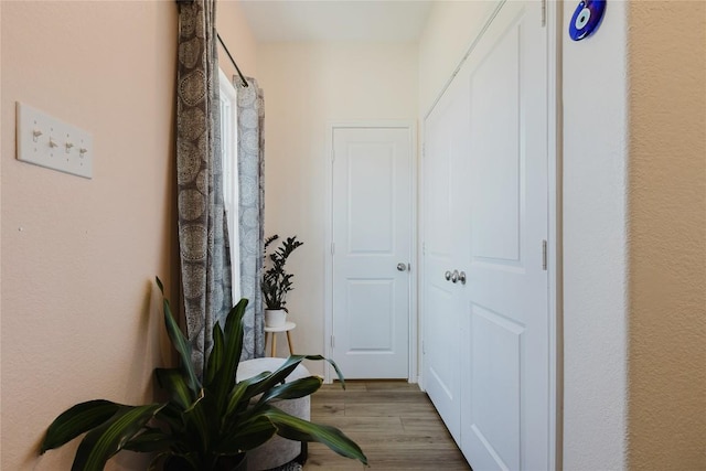 504 N Thunderstorm Ave, Lockhart, TX 78644 - hall featuring wood finished floors