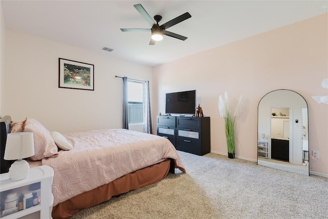504 N Thunderstorm Ave, Lockhart, TX 78644 - carpeted bedroom with baseboards and ceiling fan