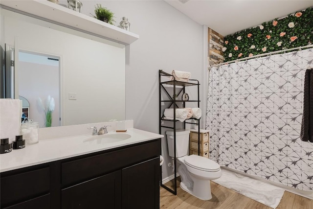 504 N Thunderstorm Ave, Lockhart, TX 78644 - bathroom featuring vanity and wood finished floors