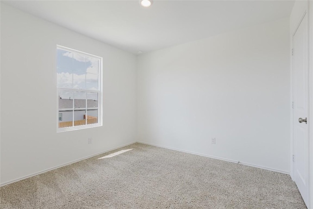 504 N Thunderstorm Ave, Lockhart, TX 78644 - empty room with carpet floors and recessed lighting