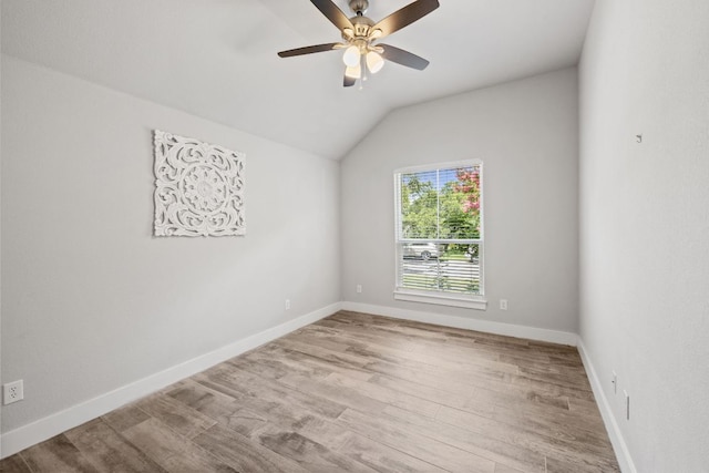 4 Country Ct, Wimberley, TX 78676 - spare room featuring vaulted ceiling, wood finished floors, and ceiling fan