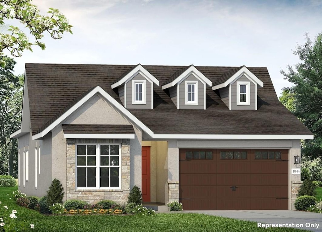 600 C-Bar Ranch Trl Unit 122, Cedar Park, TX 78613 - view of front facade with stone siding, a shingled roof, concrete driveway, and a garage