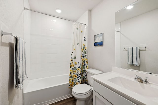 1004 Norway, Seguin, TX 78155 - full bath with vanity, shower / bath combo with shower curtain, recessed lighting, and wood finished floors