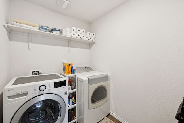 1004 Norway, Seguin, TX 78155 - laundry room with washer and dryer and baseboards