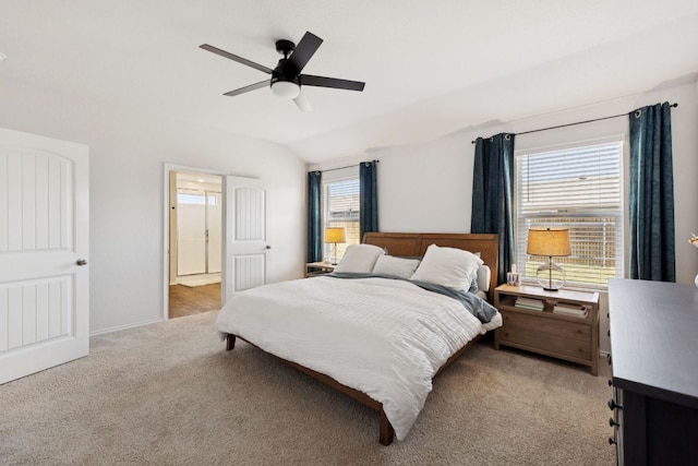 1004 Norway, Seguin, TX 78155 - bedroom featuring carpet flooring, vaulted ceiling, a ceiling fan, and ensuite bathroom