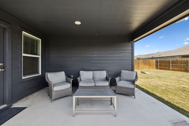 1004 Norway, Seguin, TX 78155 - fenced backyard with a patio area and an outdoor hangout area