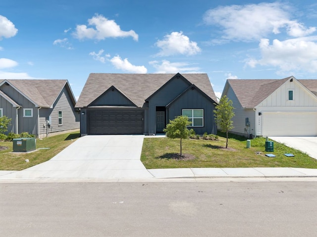 1004 Norway, Seguin, TX 78155 - single story home with board and batten siding, a garage, driveway, and a front lawn