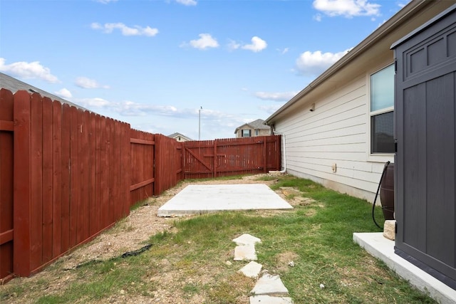 296 Blooming Trl, Kyle, TX 78640 - fenced backyard with a patio