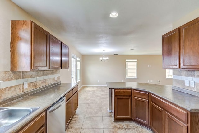 9104 Single Bend Trl, Temple, TX 76502 - kitchen featuring stainless steel dishwasher, a peninsula, backsplash, a chandelier, and plenty of natural light
