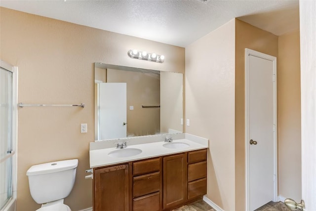 9104 Single Bend Trl, Temple, TX 76502 - full bath with double vanity, a textured ceiling, and a shower