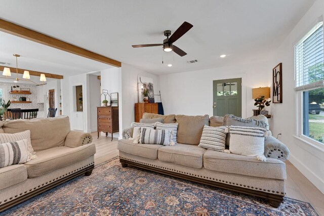215 Paulus St, Schulenburg, TX 78956 - living room with ceiling fan, wood finished floors, recessed lighting, and beamed ceiling