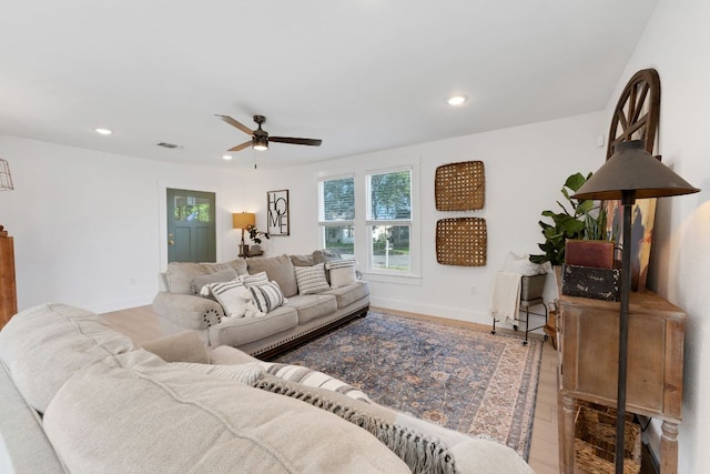 215 Paulus St, Schulenburg, TX 78956 - living area with ceiling fan, recessed lighting, and wood finished floors