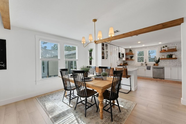 215 Paulus St, Schulenburg, TX 78956 - dining room with recessed lighting, light wood finished floors, and a chandelier