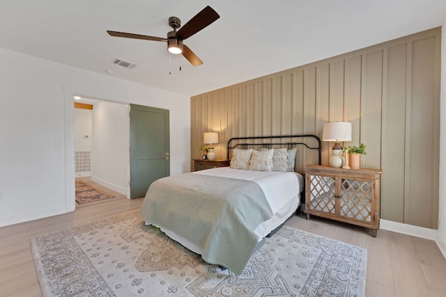 215 Paulus St, Schulenburg, TX 78956 - bedroom featuring wood finished floors and a ceiling fan