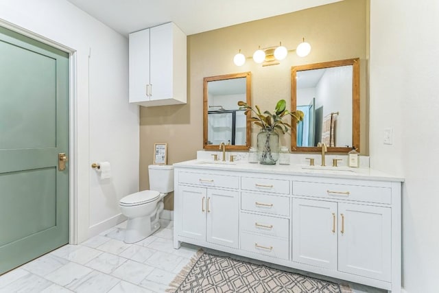 215 Paulus St, Schulenburg, TX 78956 - bathroom featuring double vanity and marble look tile flooring