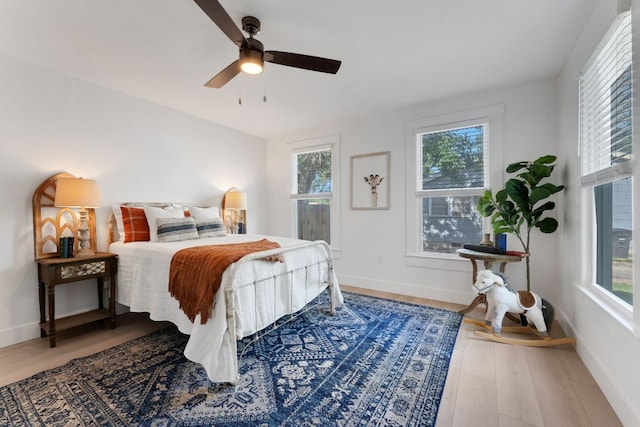 215 Paulus St, Schulenburg, TX 78956 - bedroom featuring wood finished floors and a ceiling fan