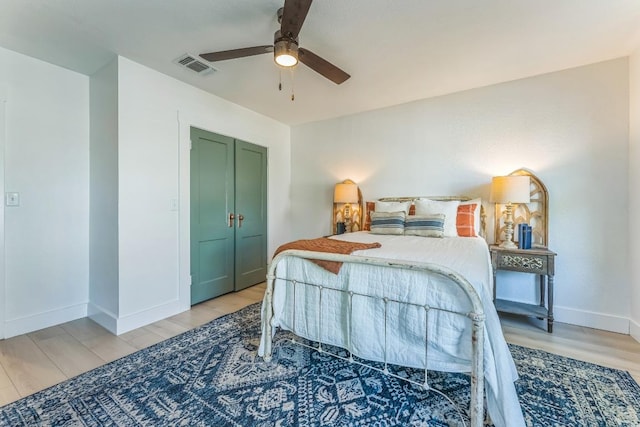 215 Paulus St, Schulenburg, TX 78956 - bedroom with light wood-type flooring and ceiling fan