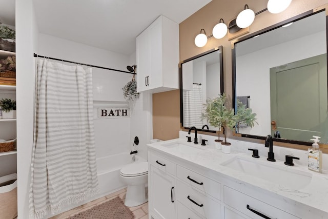 215 Paulus St, Schulenburg, TX 78956 - full bath featuring double vanity, shower / tub combo with curtain, and tile patterned floors