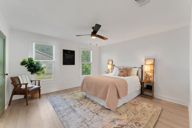 215 Paulus St, Schulenburg, TX 78956 - bedroom featuring light wood-style floors and ceiling fan