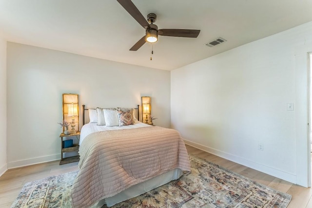 215 Paulus St, Schulenburg, TX 78956 - bedroom with light wood-style flooring and ceiling fan