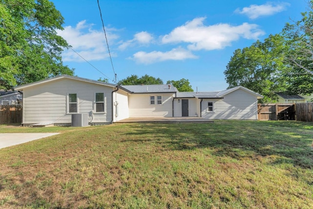 215 Paulus St, Schulenburg, TX 78956 - rear view of property featuring a metal roof