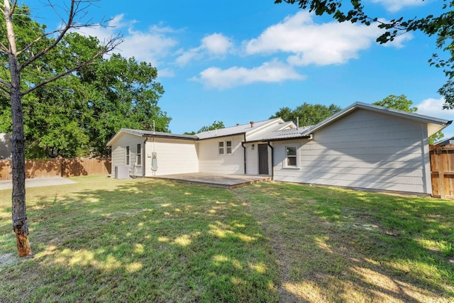 215 Paulus St, Schulenburg, TX 78956 - back of house with a wooden deck