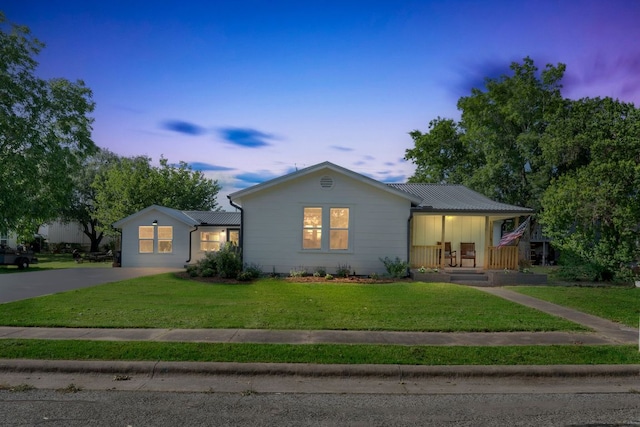 215 Paulus St, Schulenburg, TX 78956 - ranch-style home with a yard and driveway