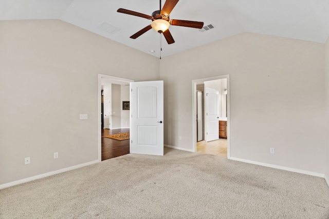 1403 Adam Ave, Burnet, TX 78611 - unfurnished bedroom with vaulted ceiling, light colored carpet, a ceiling fan, and ensuite bathroom