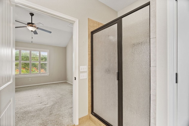 1403 Adam Ave, Burnet, TX 78611 - bathroom featuring ceiling fan, a stall shower, and lofted ceiling