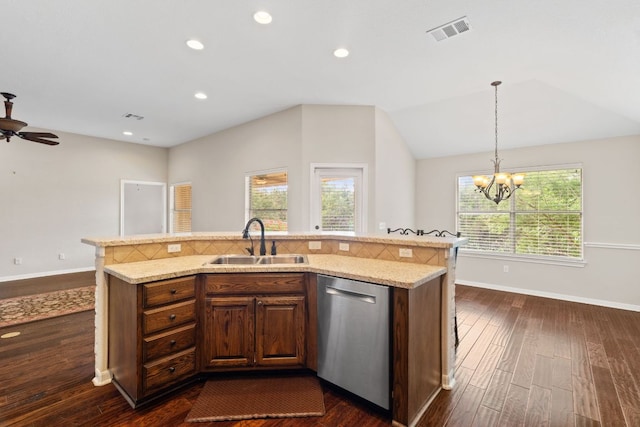 1403 Adam Ave, Burnet, TX 78611 - kitchen with dishwasher, dark wood-style flooring, a chandelier, light stone countertops, and a center island with sink