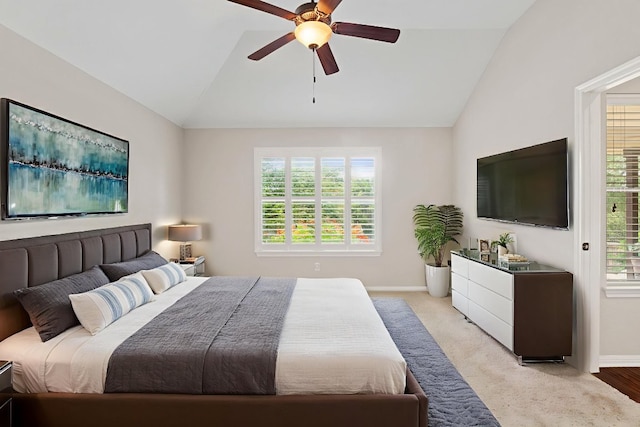 1403 Adam Ave, Burnet, TX 78611 - bedroom featuring vaulted ceiling, multiple windows, light colored carpet, and ceiling fan