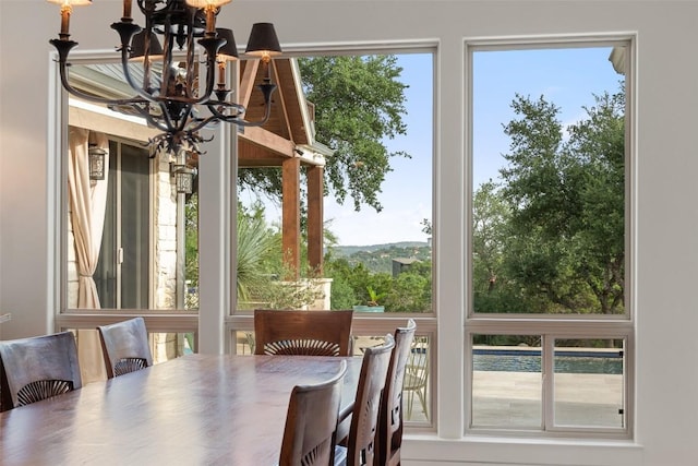 601 Crystal Creek Dr, Austin, TX 78746 - dining room with a chandelier