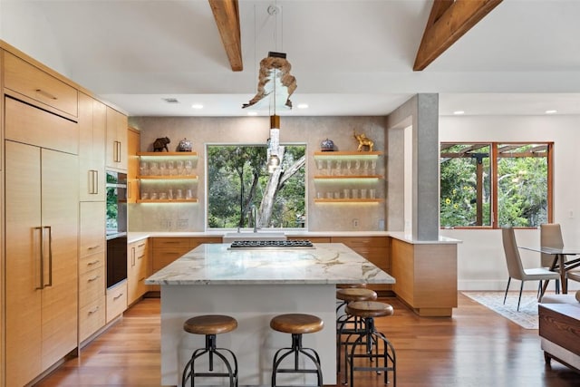 601 Crystal Creek Dr, Austin, TX 78746 - kitchen with open shelves, light wood-style flooring, a kitchen breakfast bar, modern cabinets, and beam ceiling
