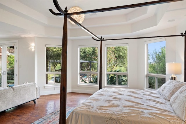 601 Crystal Creek Dr, Austin, TX 78746 - bedroom with wood finished floors and baseboards