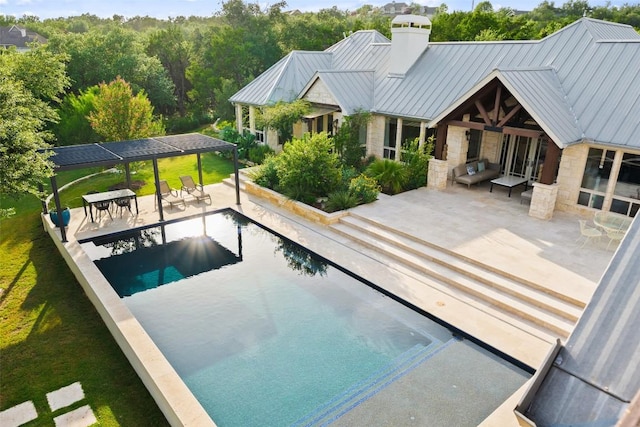 601 Crystal Creek Dr, Austin, TX 78746 - outdoor pool featuring a patio