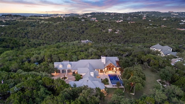 601 Crystal Creek Dr, Austin, TX 78746 - view from above of property with a heavily wooded area