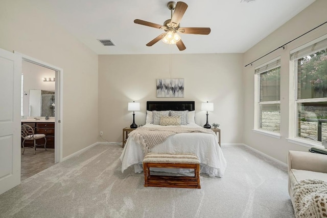 250 Lexington Dr, Austin, TX 78737 - bedroom with carpet flooring, connected bathroom, and a ceiling fan