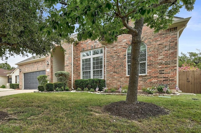 250 Lexington Dr, Austin, TX 78737 - view of front facade featuring brick siding, a garage, and driveway