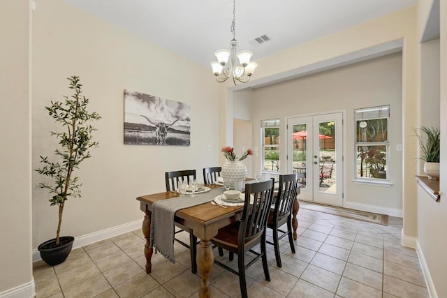 250 Lexington Dr, Austin, TX 78737 - dining area with a chandelier, light tile patterned flooring, and french doors