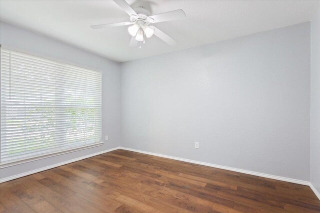 1811 Indian Summer Pass, Round Rock, TX 78665 - spare room with wood finished floors and a ceiling fan