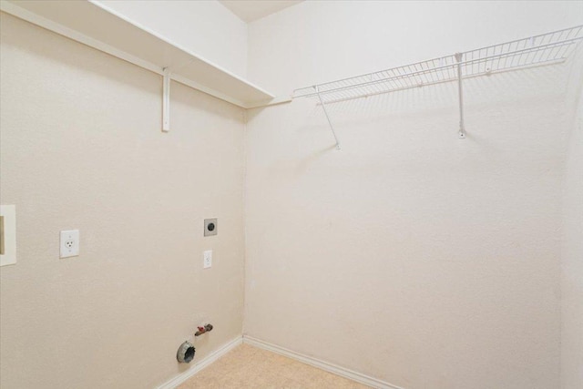 1811 Indian Summer Pass, Round Rock, TX 78665 - laundry area featuring baseboards and electric dryer hookup