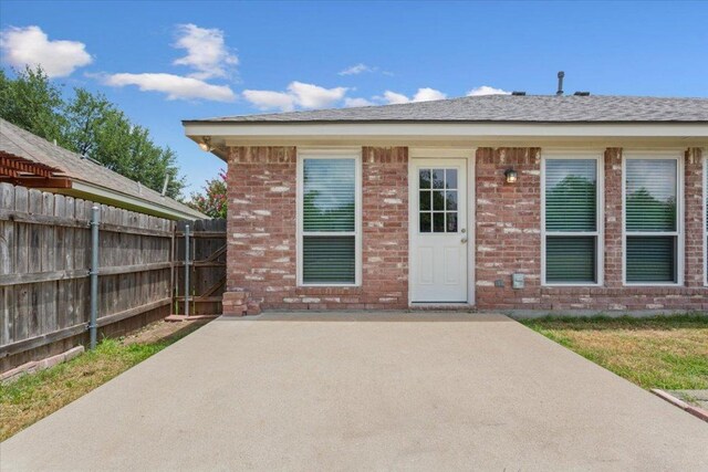 1811 Indian Summer Pass, Round Rock, TX 78665 - entrance to property with a patio and brick siding