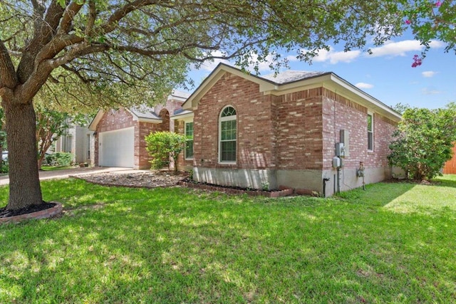 1811 Indian Summer Pass, Round Rock, TX 78665 - view of front facade featuring brick siding, a front lawn, a garage, and concrete driveway