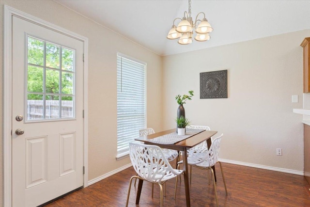 1811 Indian Summer Pass, Round Rock, TX 78665 - dining area featuring a chandelier, plenty of natural light, and dark wood finished floors
