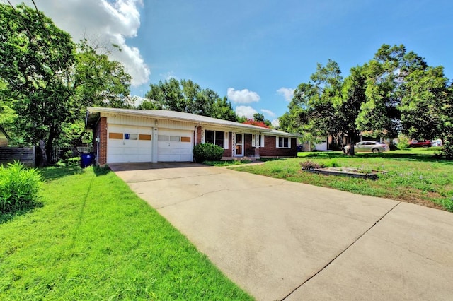 11907 Oak Trl, Austin, TX 78753 - ranch-style home with an attached garage, concrete driveway, a front lawn, and brick siding