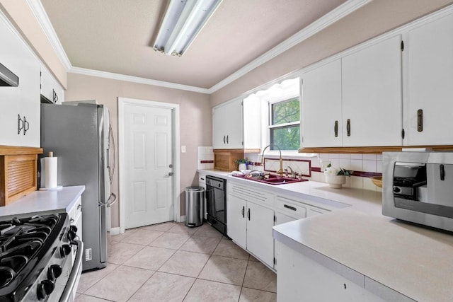 11907 Oak Trl, Austin, TX 78753 - kitchen featuring appliances with stainless steel finishes, light countertops, backsplash, ornamental molding, and white cabinetry